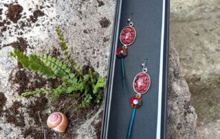 Boucles cuir et plume Boucles cuir et plume