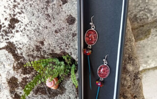 Boucles cuir et plume Boucles cuir et plume